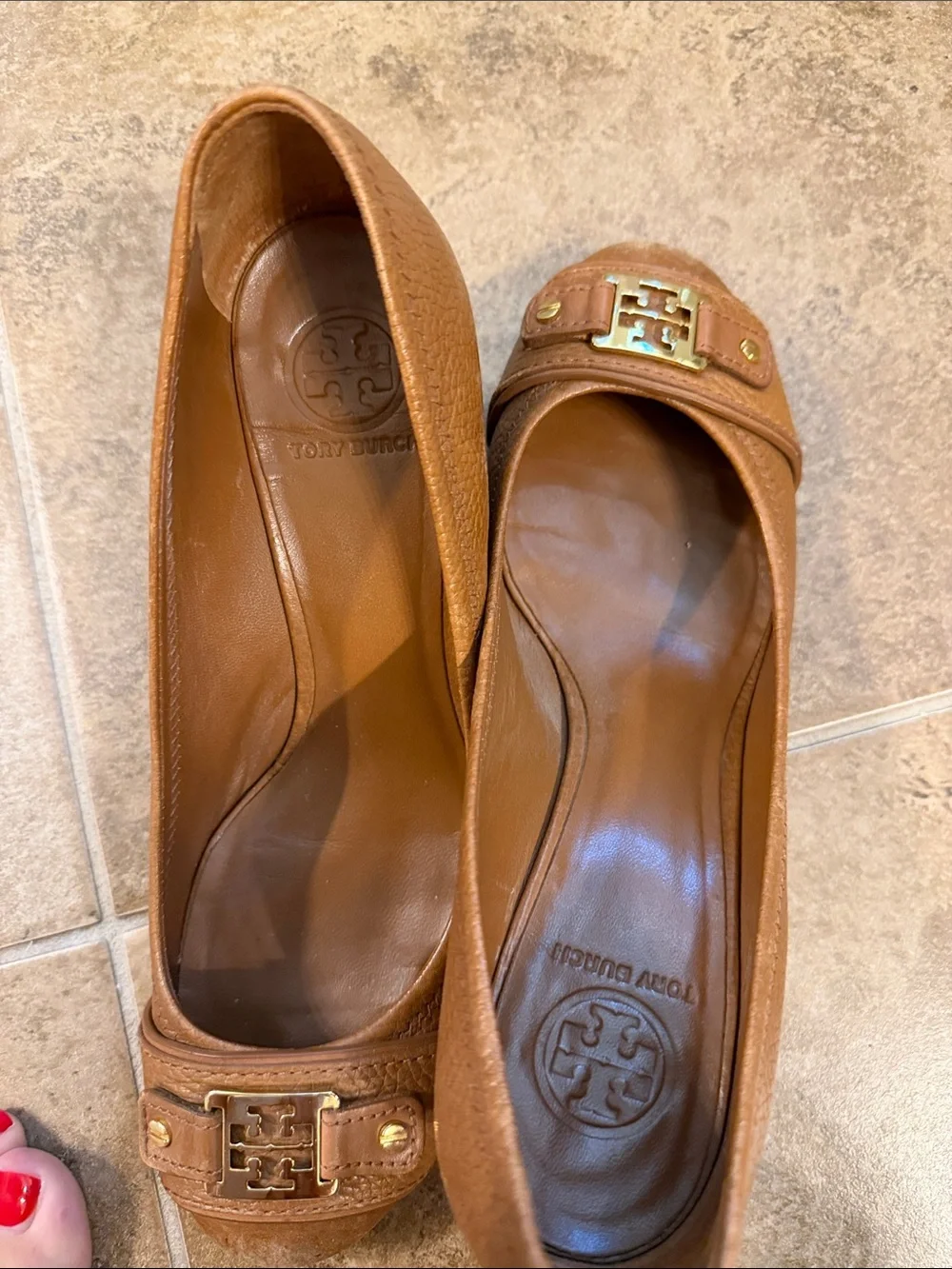 Tory Burch Cognac Leather Logo Cap-Toe Heels- worn on the front